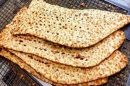 توزیع نان صلواتی در بقاع متبرکه قم همزمان با وفات حضرت معصومه(س)